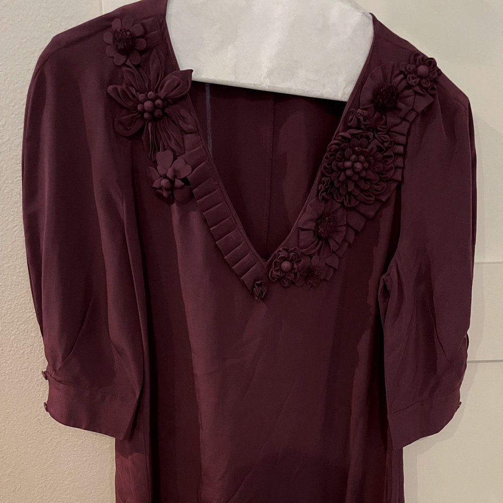 Trina Turk silk top in merlot. Wore it twice and dry cleaned.